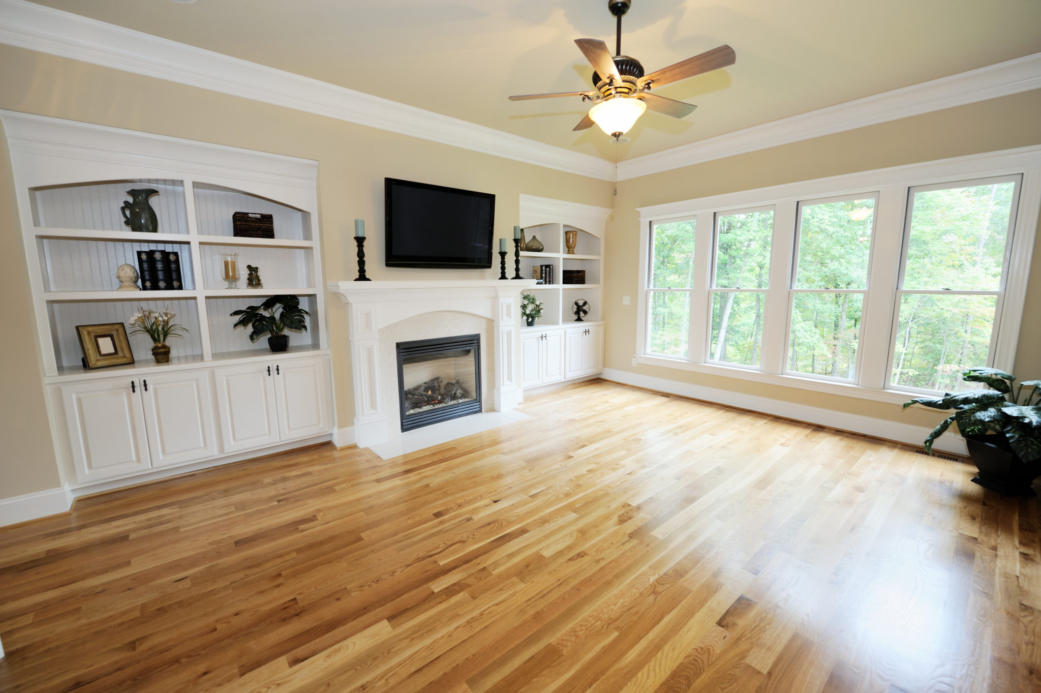 Living room interior with tan wooden floor and no sofas Marie Claire